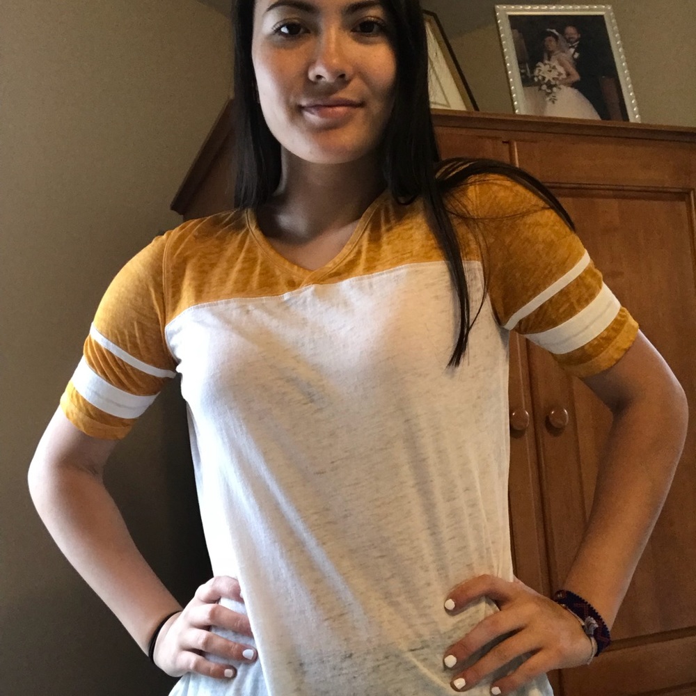 yellow sleeved baseball tee